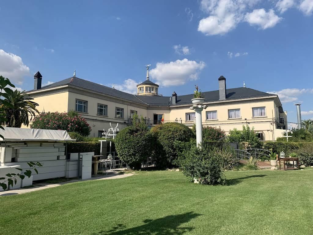 Modern terrace and main building at El Mirador de Cuatro Vientos Madrid