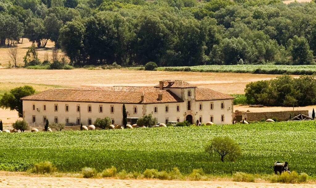 Traditional architecture and outdoor terraces at Casa de Oficios Estate Madrid